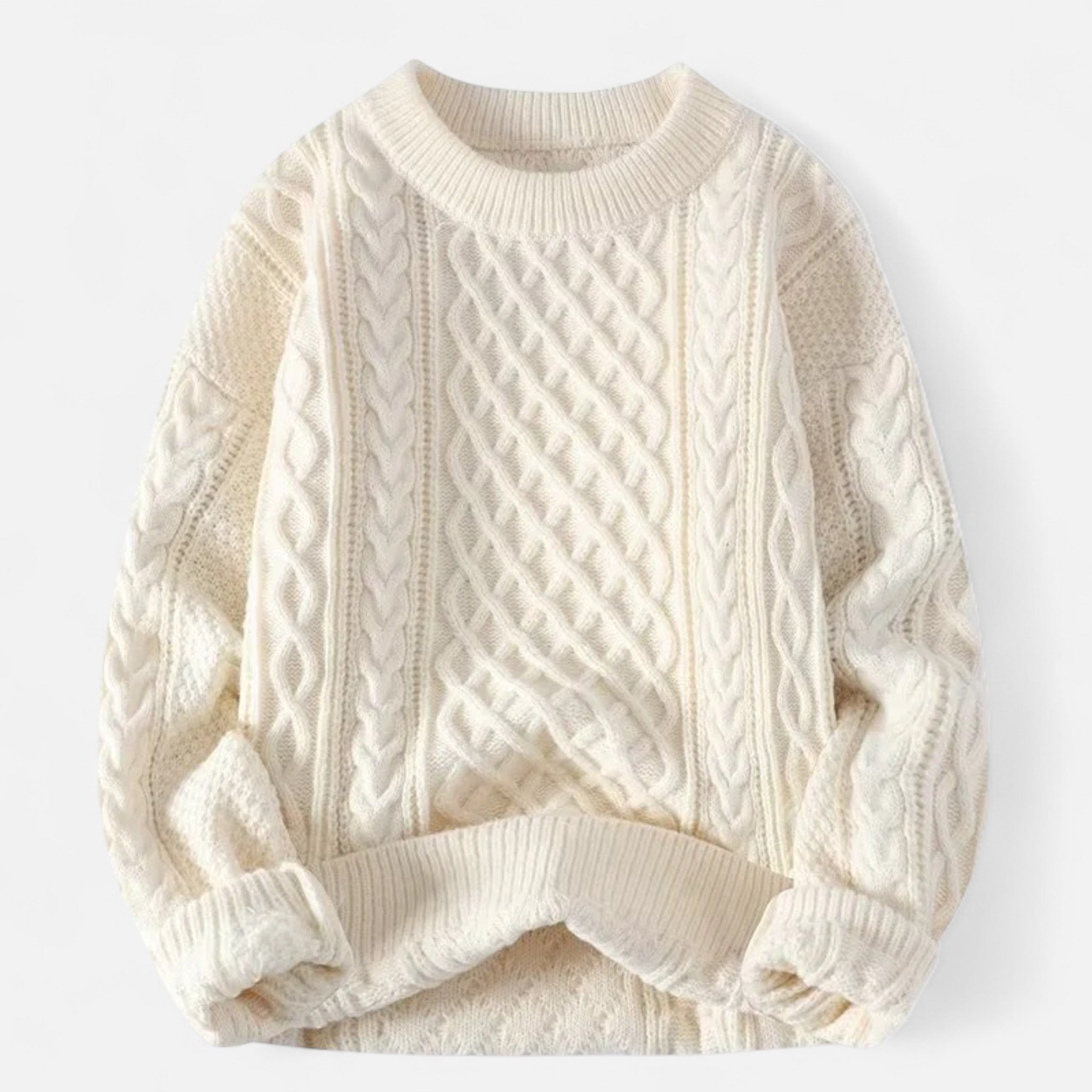 Cream-colored cable knit sweater on a white background